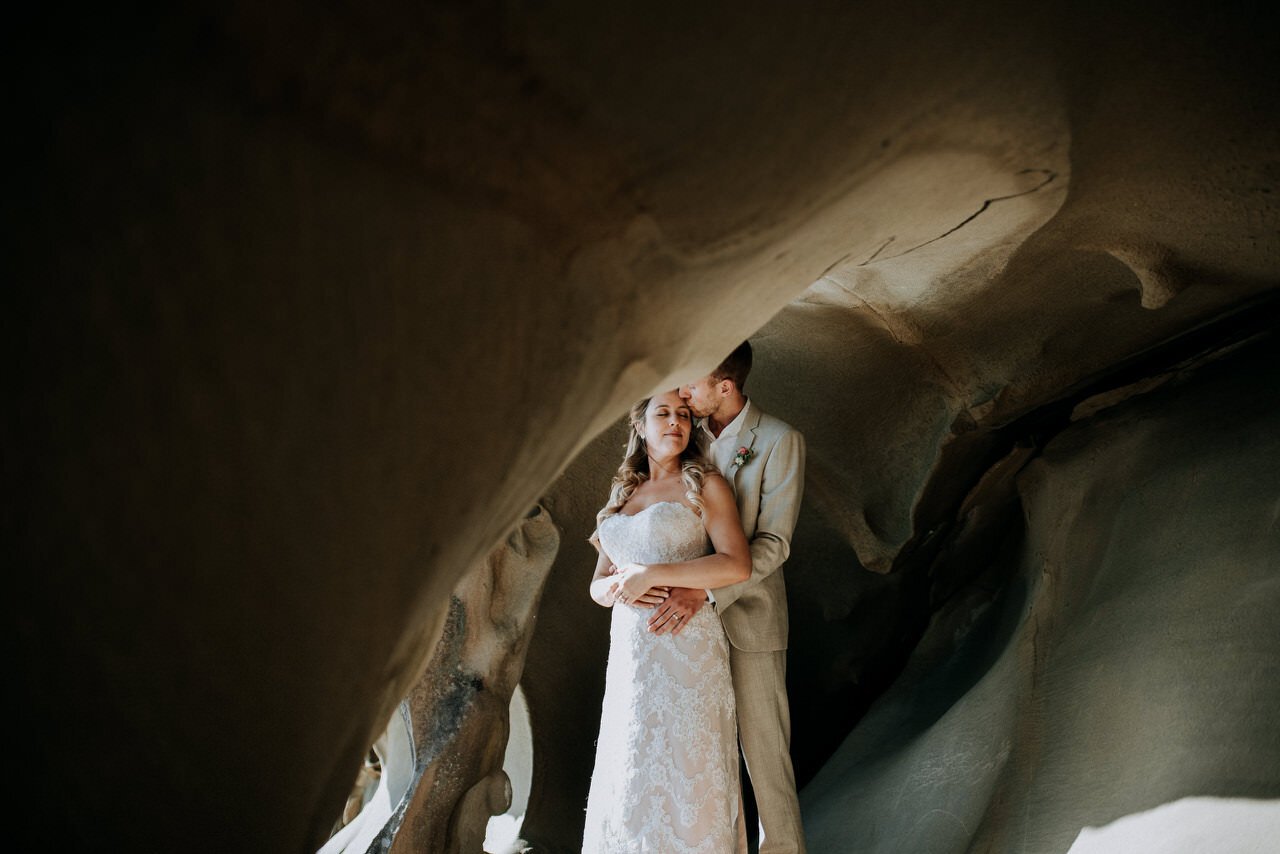 bride and groom portrait at sea caves galiano island