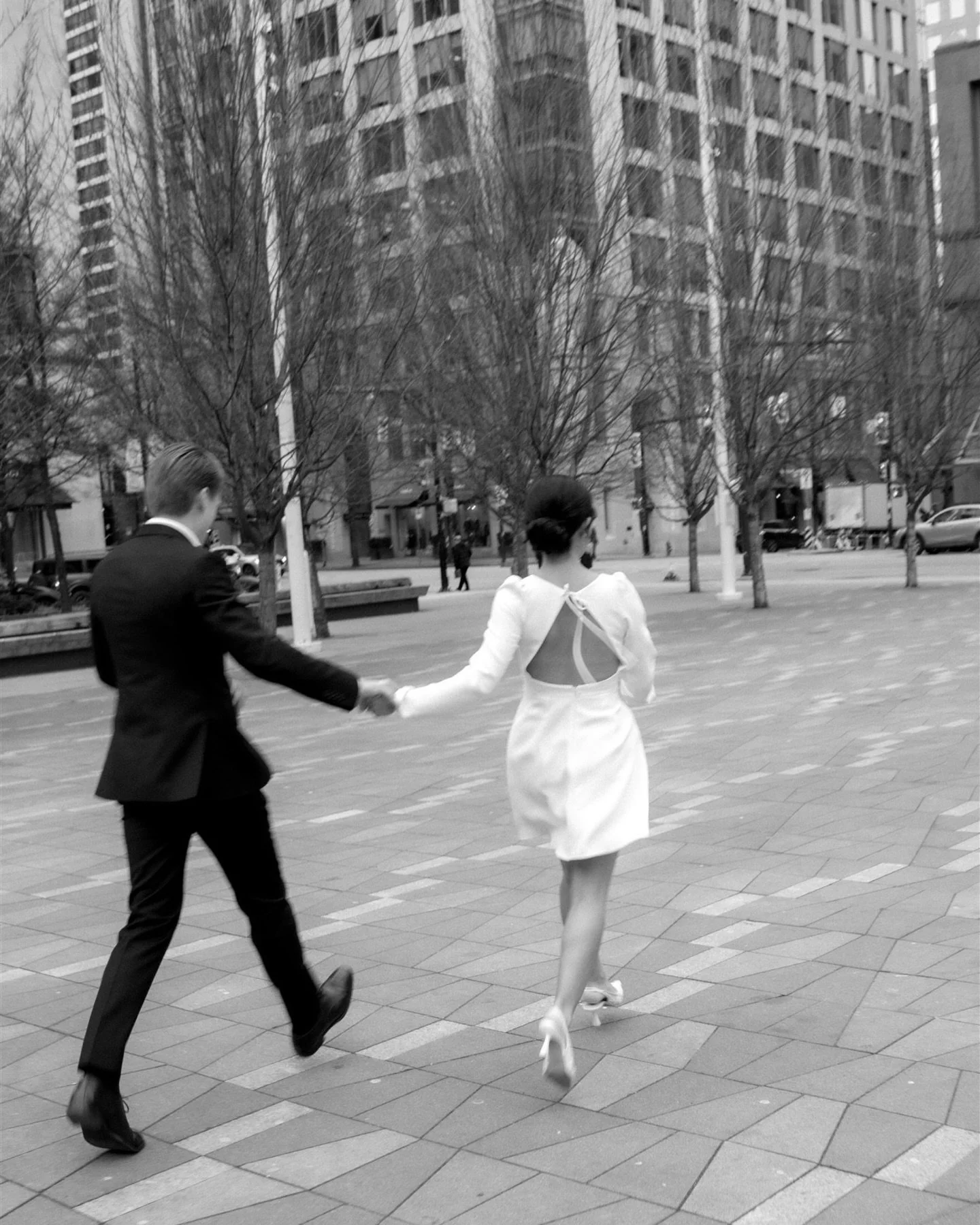 Dressed up or laid-back for your engagement photos? 

Personally I&rsquo;m here for an elegant dress and suit combo in an urban setting, I think it looks so city chic!  D+J fully committed to the vision for this one&hellip;even freezing their way thr
