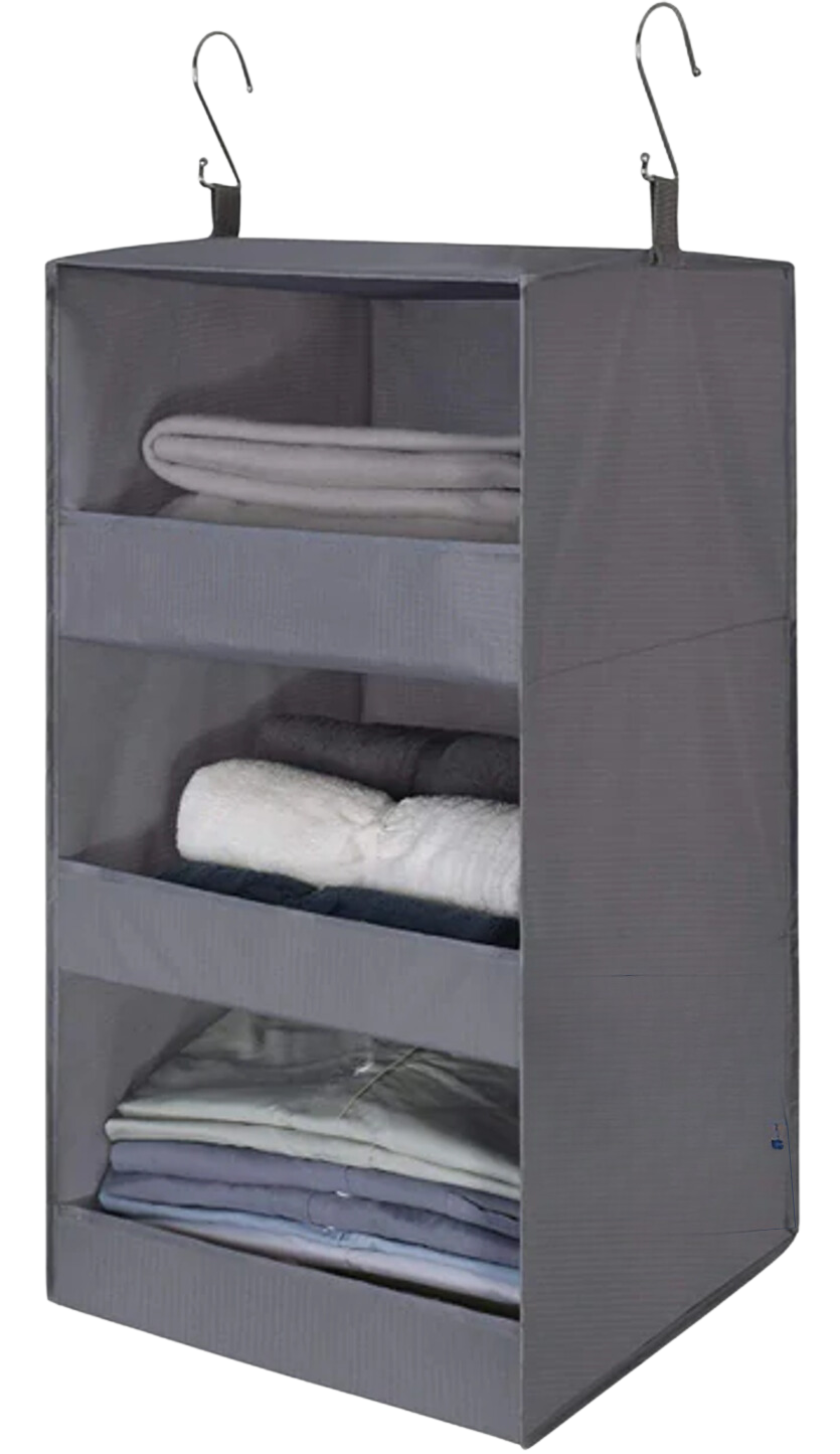 Gray fabric closet organizer with three shelves containing folded blankets and sheets, hanging hooks at the top.