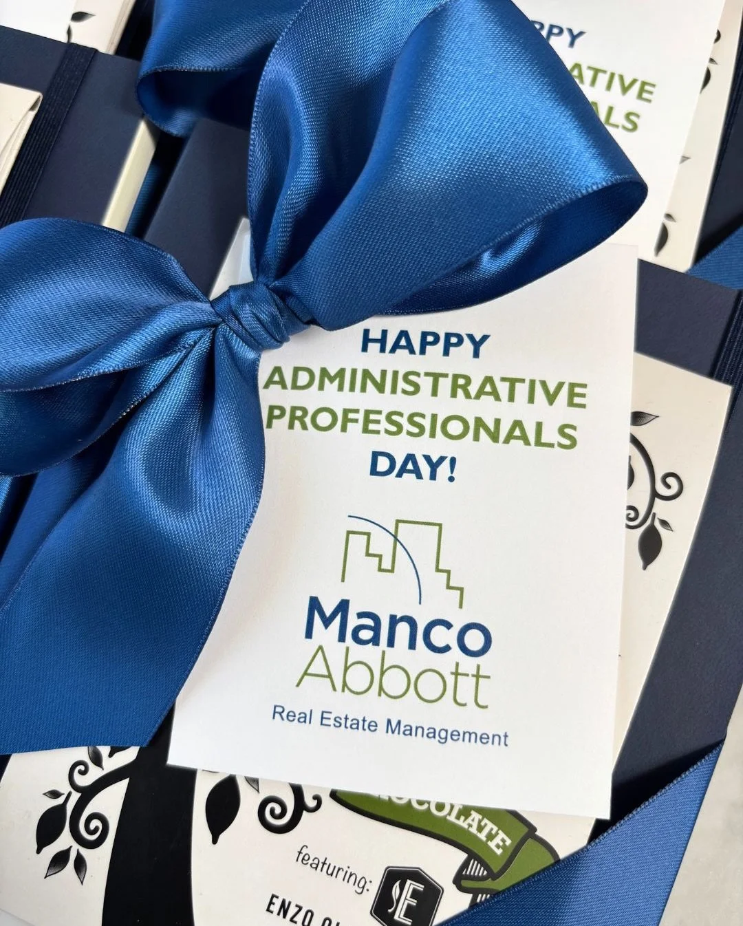 Today is Administrative Professionals Day! 👩🏽&zwj;💻

To celebrate the hardworking admin professionals at @mancoabbott we kept it easy and intentional. A simple branded notebook paired with a local fave 🍫 @raphio.chocolate wrapped together with ri