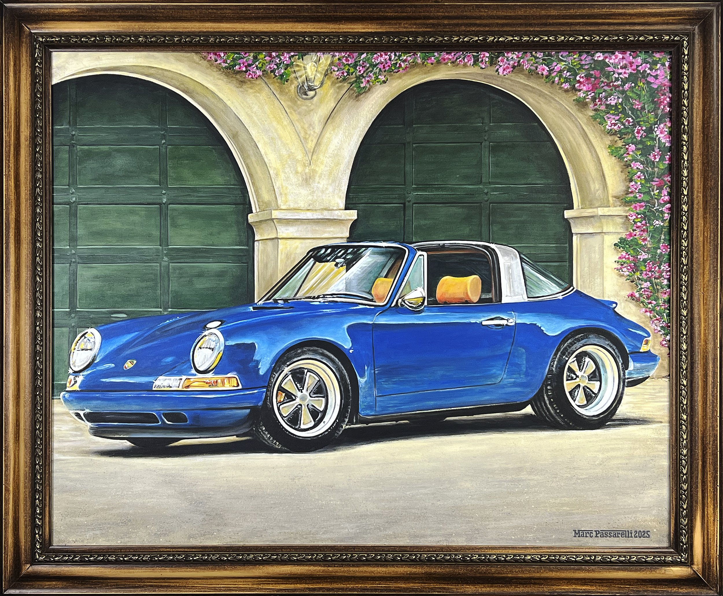 Painting of a blue convertible sports car with the top down, parked in front of a green garage door with an arched yellow stone surround. The scene is framed in a wood frame, and the artist's signature and date, Marc Passarelli 2025, are in the bottom right corner.