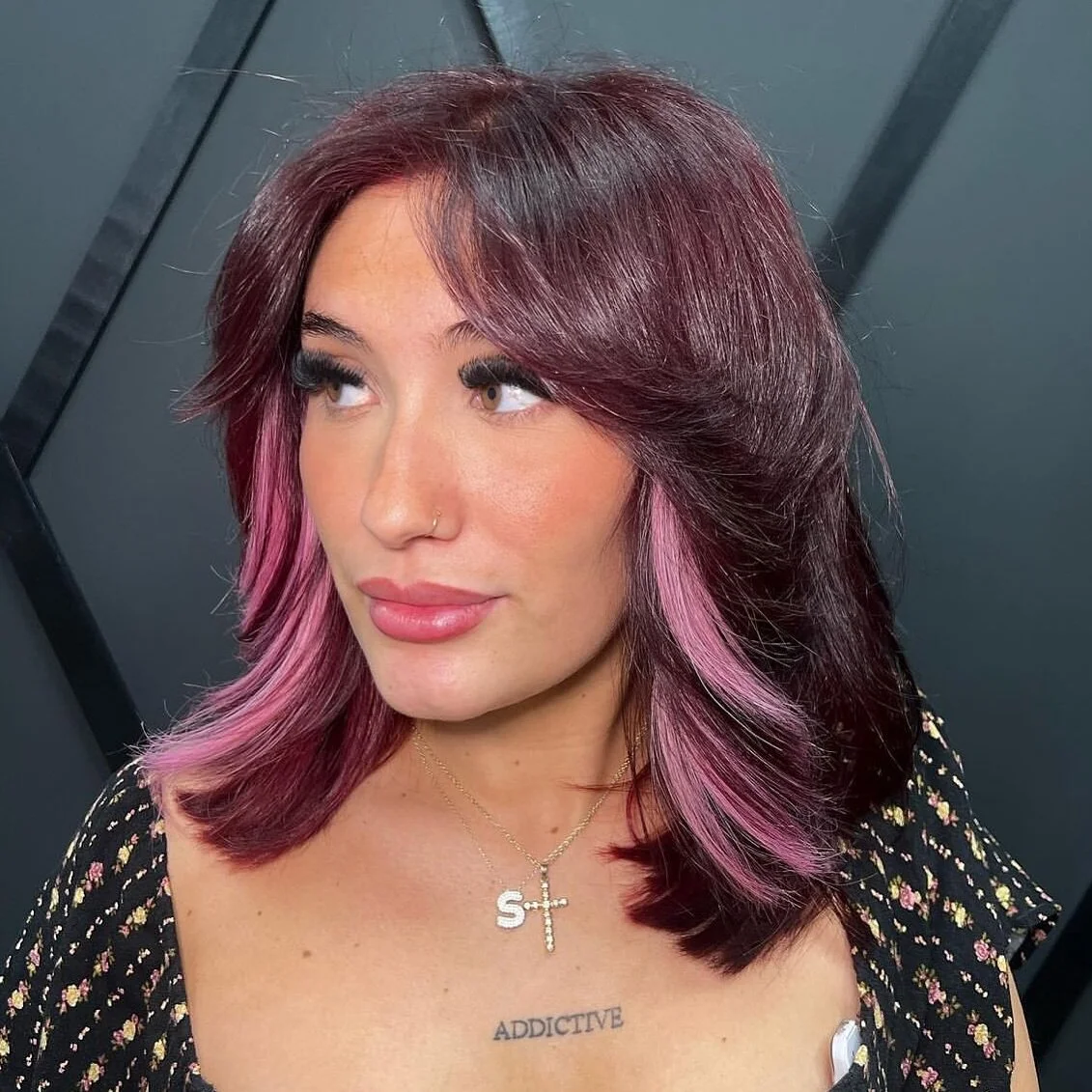 A &ldquo;peek-a-boo&rdquo; highlight refers to a hair highlighting technique where the highlights are strategically placed underneath the top layer of hair, creating a subtle, peek-a-boo effect when the hair moves or is styled in certain ways. This t