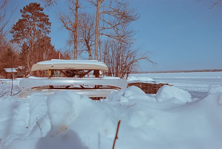 Canoes in Ely Minnesota winter