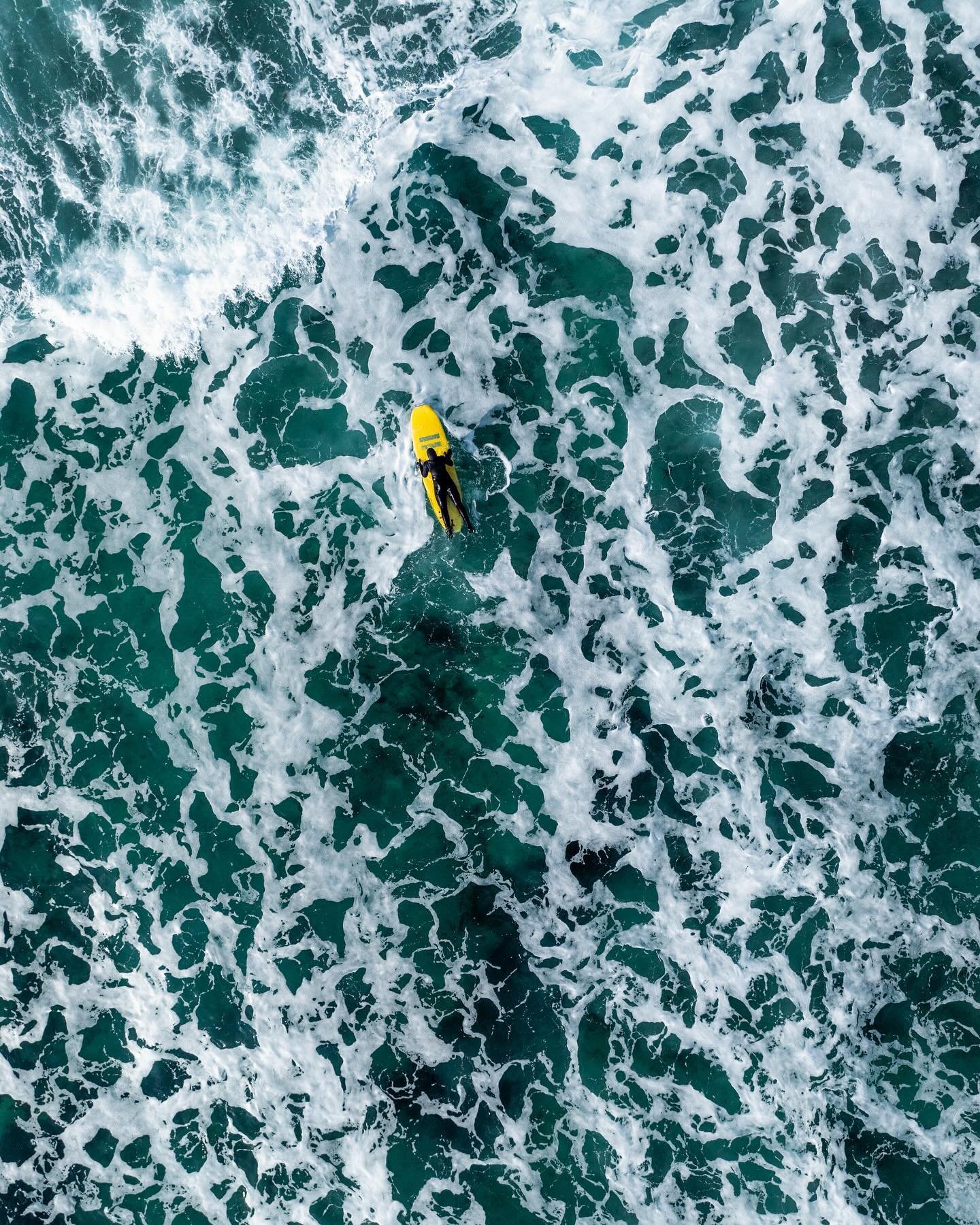 Arctic surfers.

I have immense respect for those people who can brave this bone chilling cold and hit the ocean for surfing. At one of the most remote beaches in the whole world, probably a paradise for surfers - I saw a bunch of people enjoying and