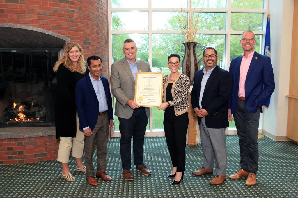 CEO Nicole Esposito, EdD and State Representatives celebrate CT State Manchester's prestigious status