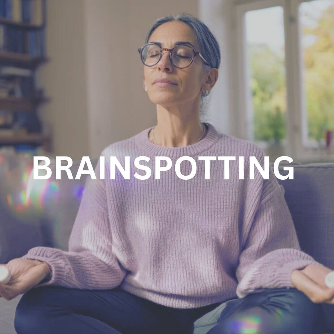 woman in glasses sitting in peace