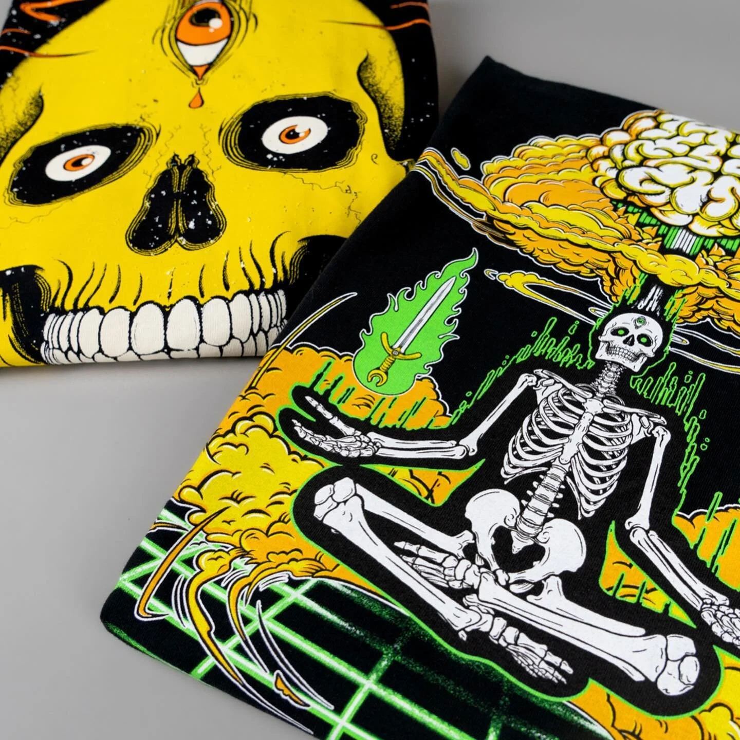 Which one of these graphics is your favorite?

Our first two garments we&rsquo;ve gotten made! They both look amazing. Every time I wear one out, it&rsquo;s turning heads. And that is such a good feeling having people acknowledge your art and legitim