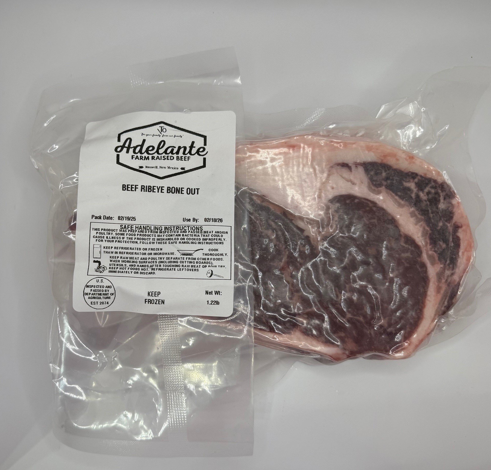 Beef Ribeye Boneout Frozen with Label.jpg