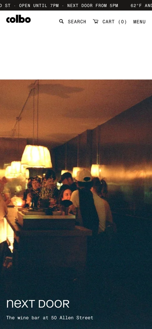 Mobile screen: Next Door, the bar beside the shop