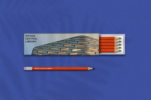Pencil set in a blue sleeve printed with the library building