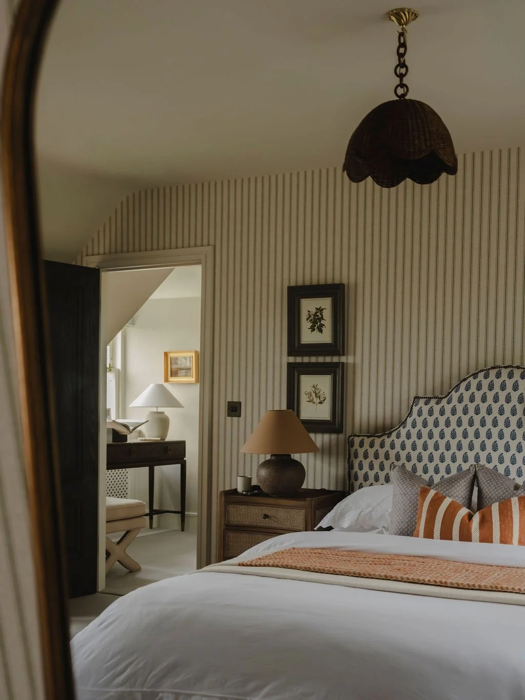 Calm bedroom retreat with bespoke bed and layered finishes in Bourne End, Buckinghamshire
