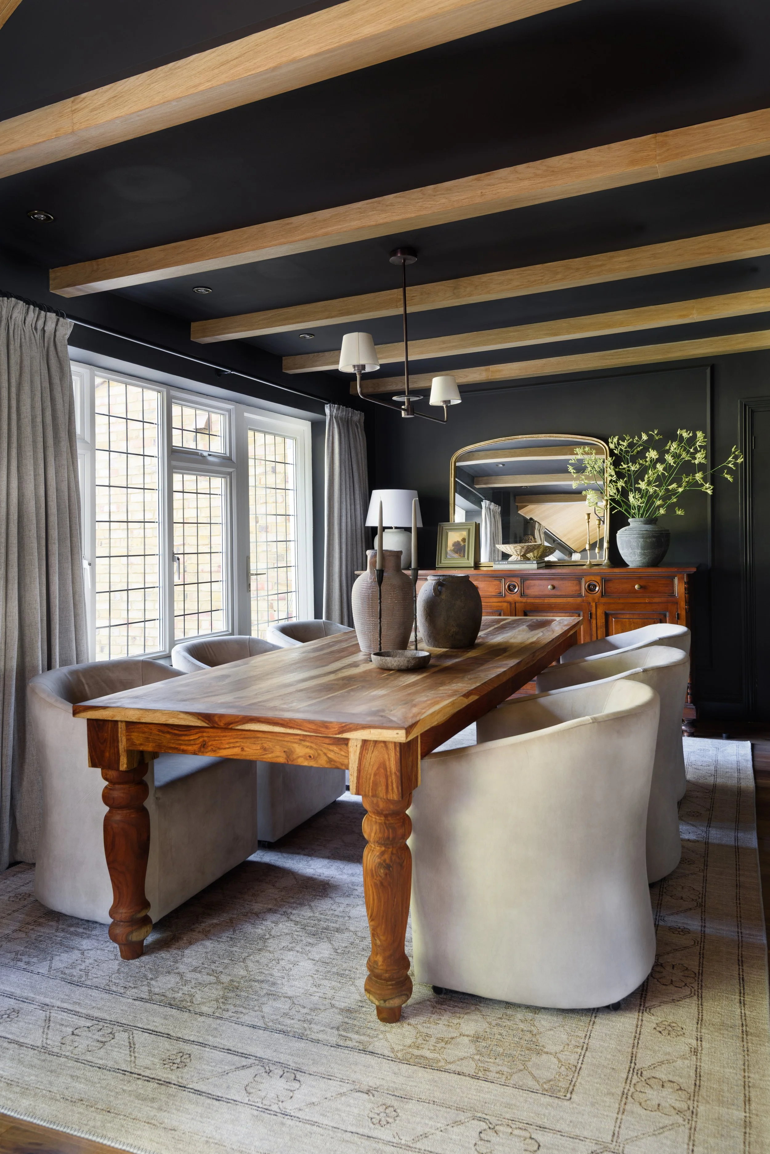 Dining area interior with elegant table styling in a transitional living and dining room, Beaconsfield, Buckinghamshire