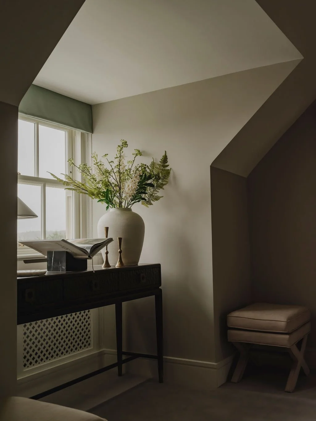 Refined detail view of landing space with layered finishes in Bourne End
