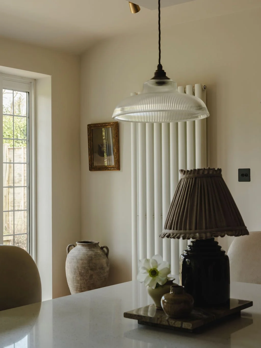 Neutral kitchen design creating a calm and cohesive space