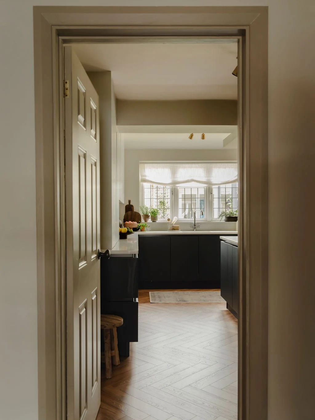 Kitchen interior design in Buckinghamshire with warm flooring and soft lighting