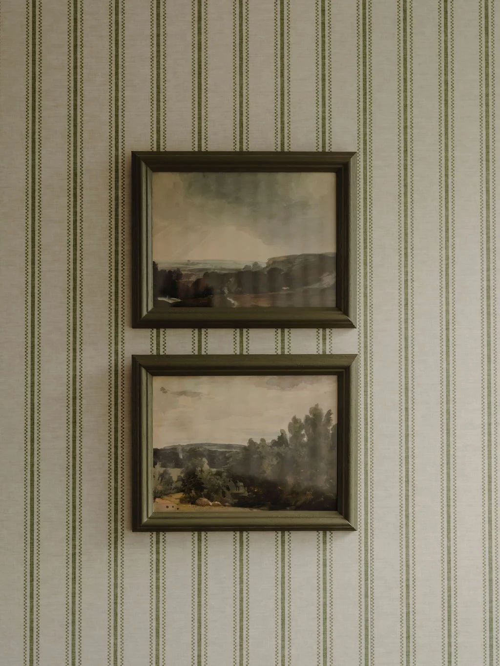 Wall art pairing detail within a calm Bourne End, Buckinghamshire bedroom design
