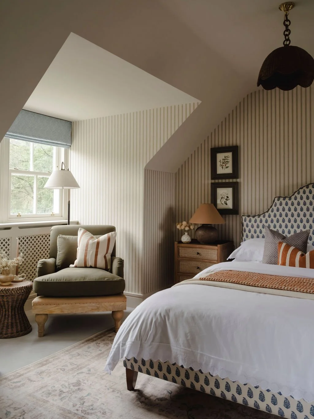 Bespoke bed and plush textiles in a calm Bourne End, Buckinghamshire bedroom interior

