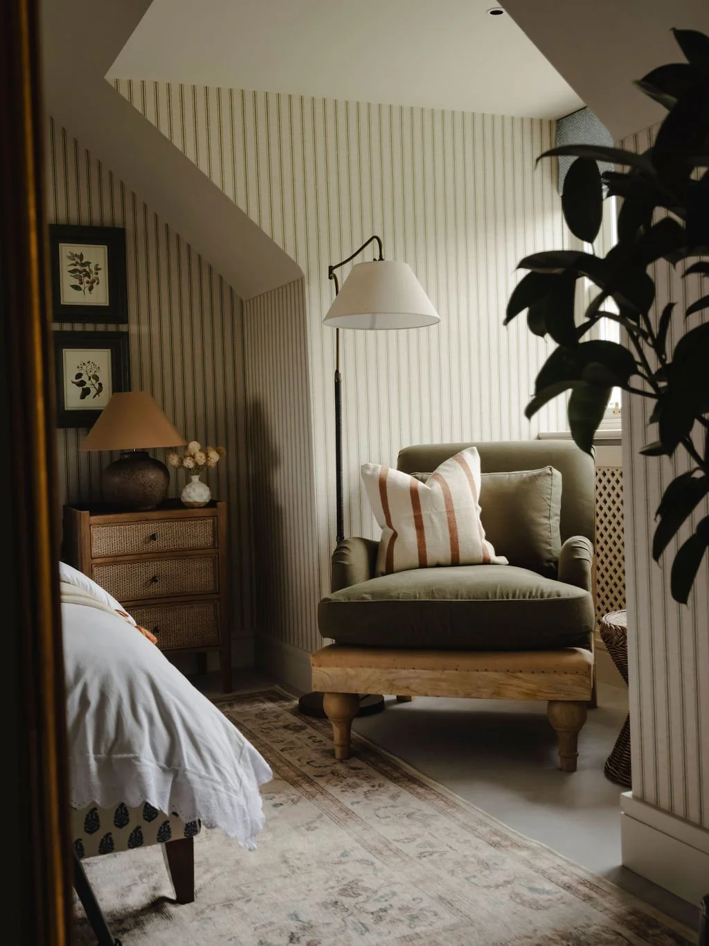 Accent armchair within a calm Bourne End, Buckinghamshire bedroom design
