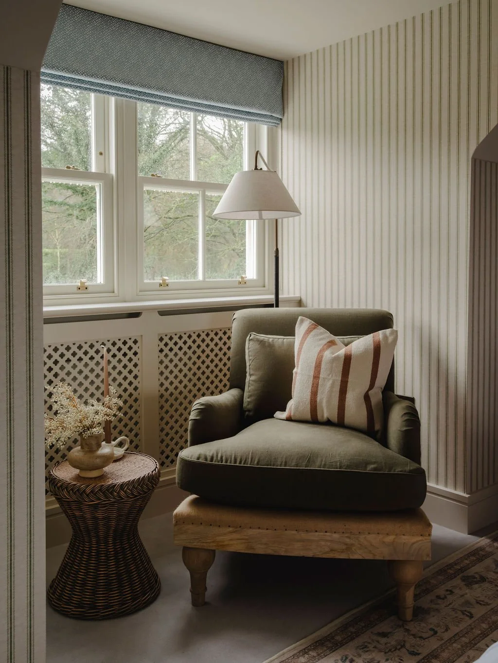 Bedroom seating and side table styling in a refined Bourne End, Buckinghamshire interior design
