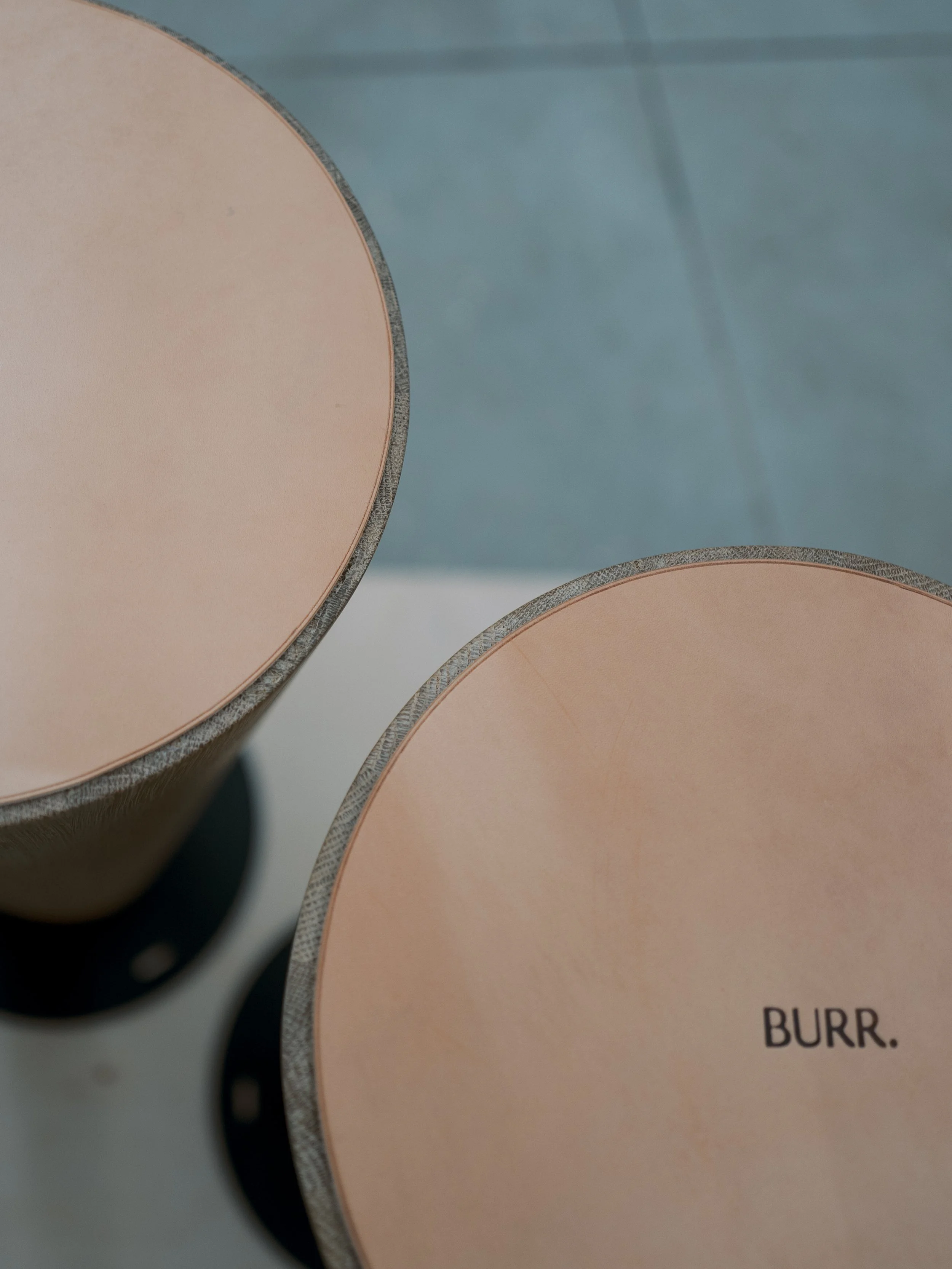 Close-up of two table legs, Showing detail on the underside