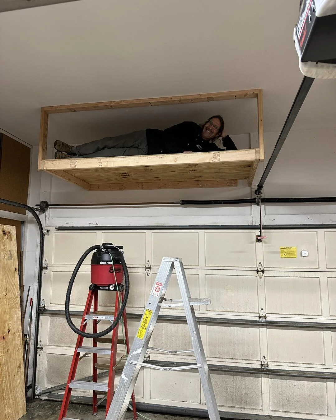 My new garage loft! We needed this to store our packaging supplies and other materials for our flags. Now if I could just blink to duplicate it!