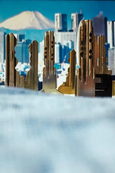 Creative smartphone photo of house keys looking like skyscrapers