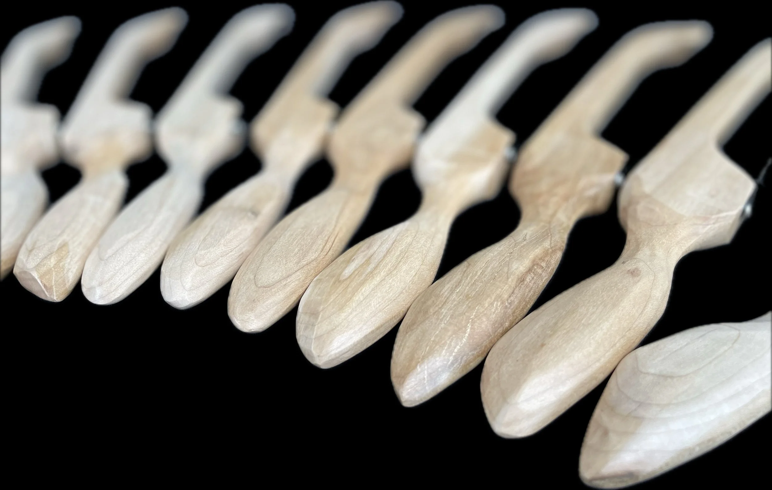 Multiple wooden Bow Bread knife.  Locally sourced wood in Dix Hills,  NY. Healthy Food. Wood Cutting Board. Woodworking. Sourdough bread. Reclaimed wood. Unique gift idea. Woodworking shop in Long Island New York. Custom wood. Kitchen. Craft. craftin