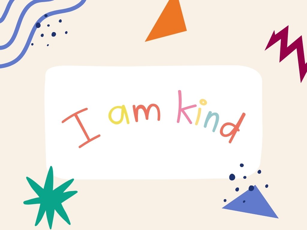 "I am kind" affirmation drawn in crayon with irregular shape patterns surrounding it