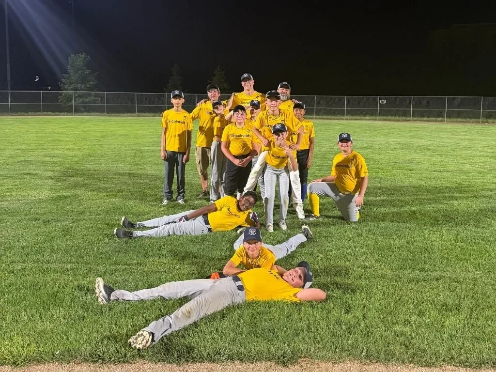 Junior boys baseball team in yellow lincoln kids uniforms