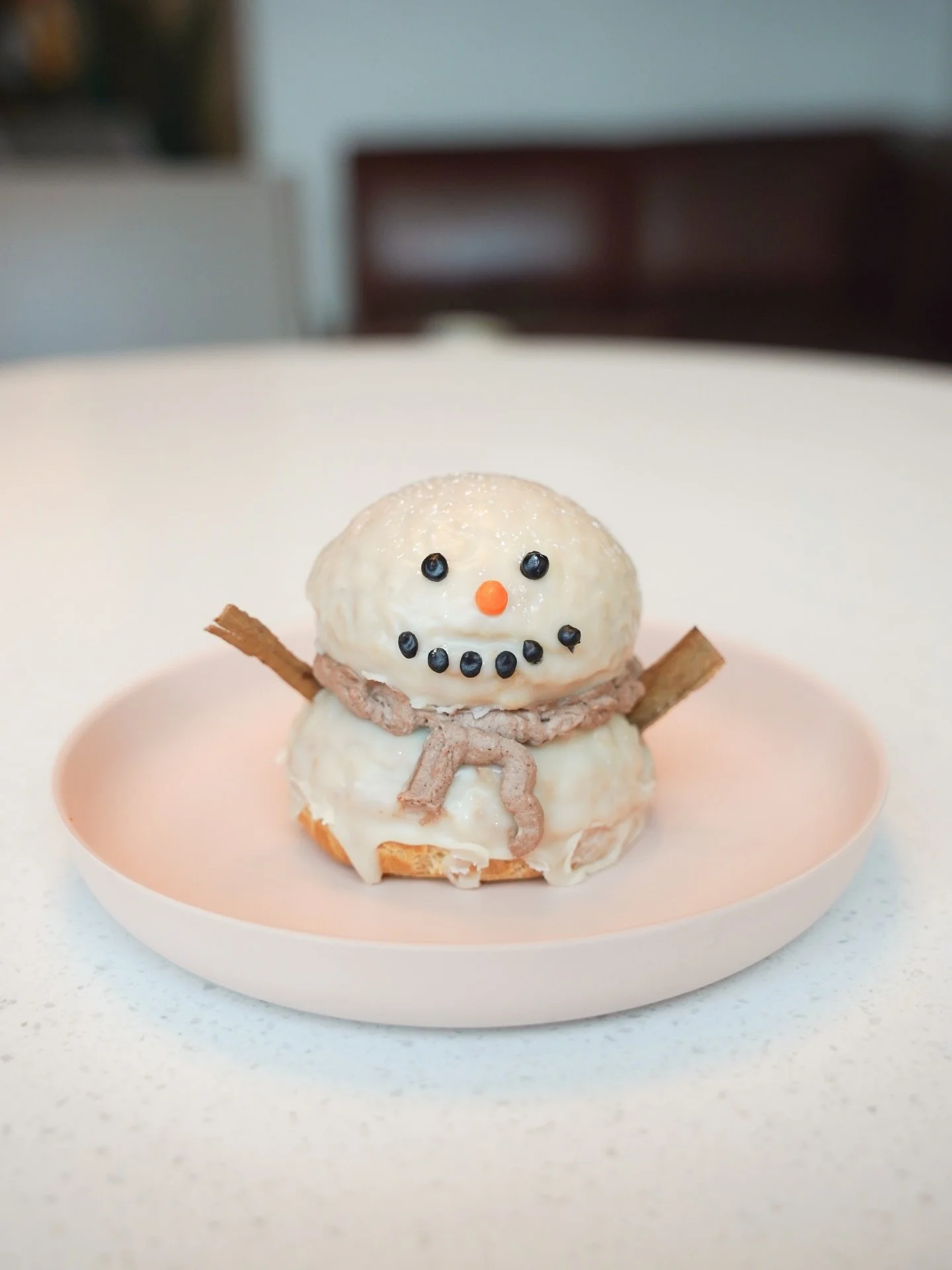 This past week our bakers made the cutest holiday cream puffs ⛄️ we will continue to have sweet treats as we near Christmas so be sure to come in and try one 😌