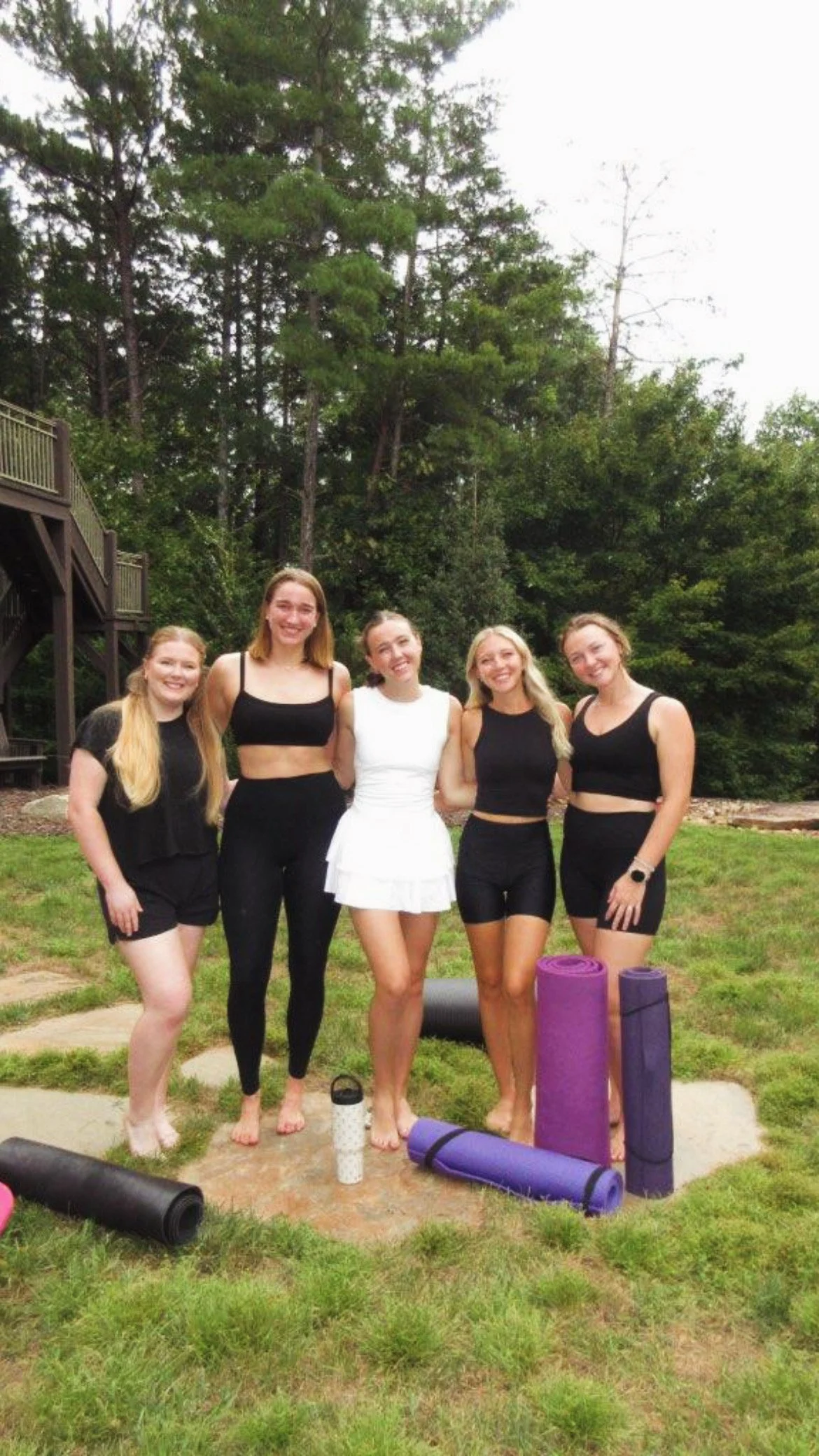 Five young women in their twenties after a yoga class