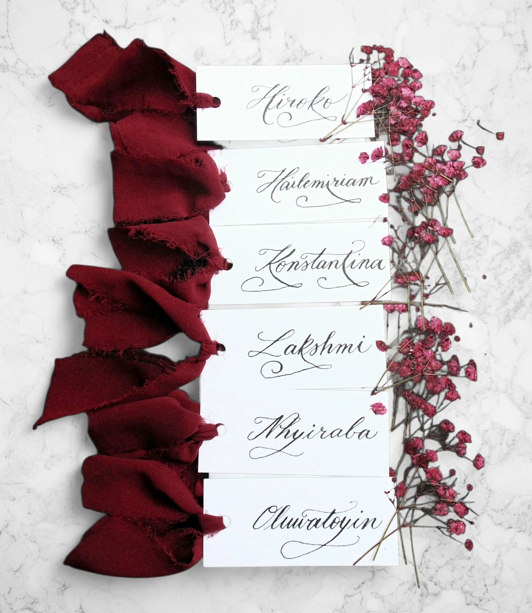 Sher-Pierre-NJ-NY-NYC-Calligrapher-and-Engraver-Engraved-Wine-Glass-Place-Cards-With-Ribbons.jpg