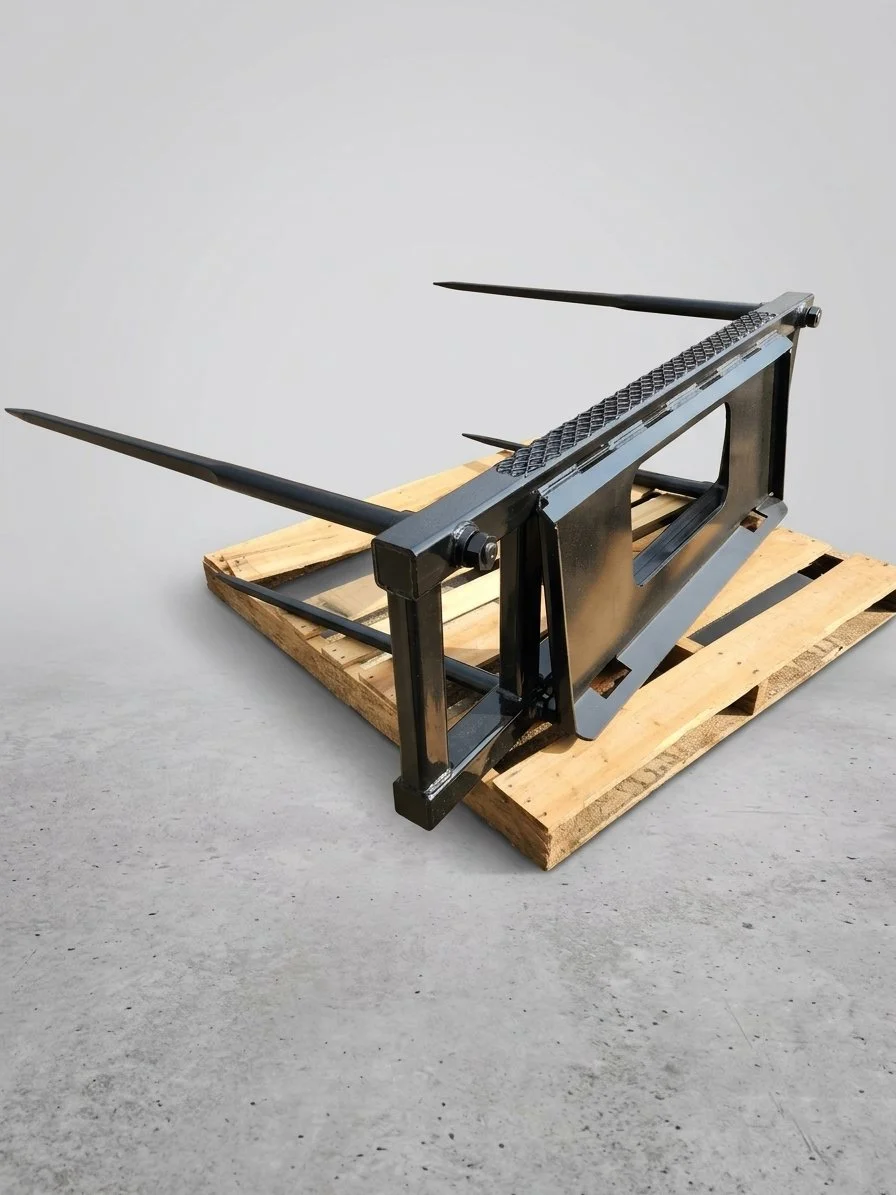 Custom 4-tine tractor bale spear attachment with heavy duty skid steer quick attach mounting frame fabricated on pallet in Bismarck ND