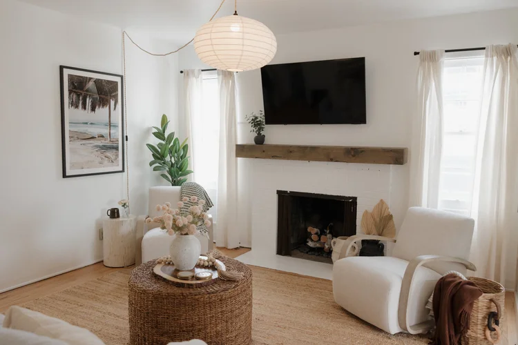Living room inside Wavehouse with a fireplace and a smart TV
