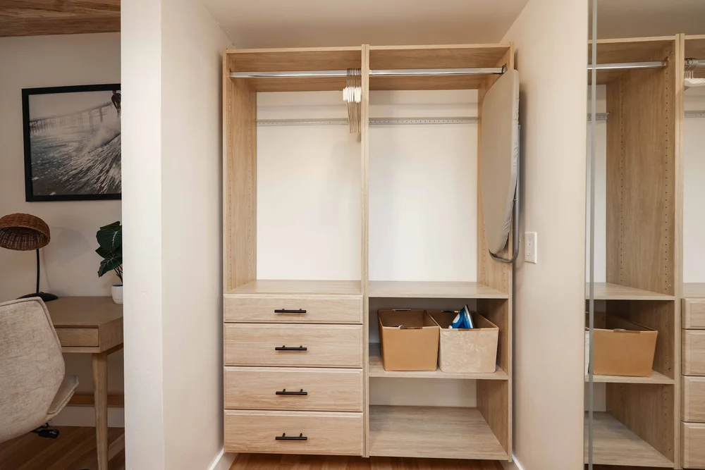 The walk-in closet with shelves and drawers in Unit Two at The Swell, Oceanside