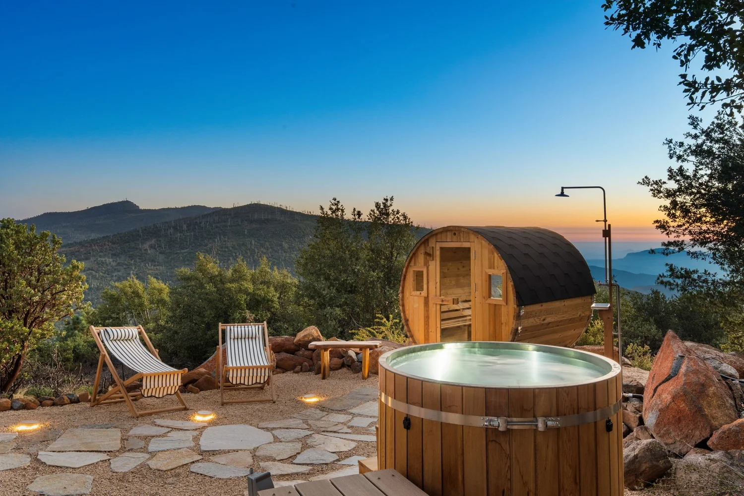 Restore Outpost deck with lounge chairs and mountain views near Julian