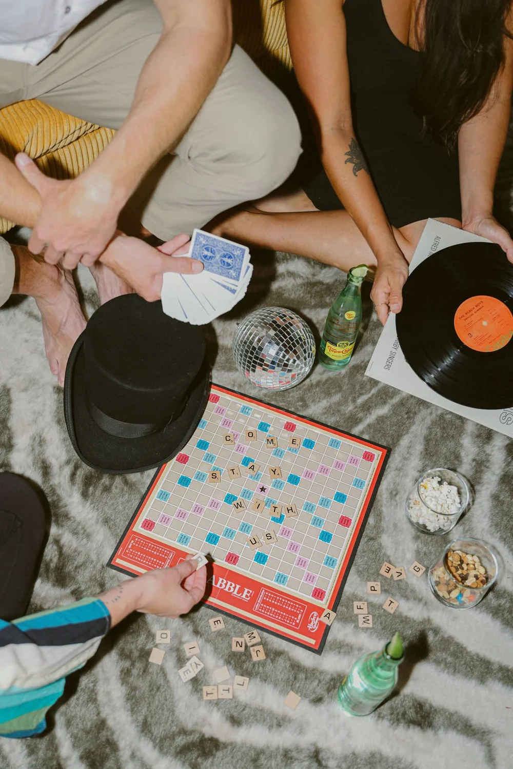 A board game and records on the coffee table at Palm Parkside