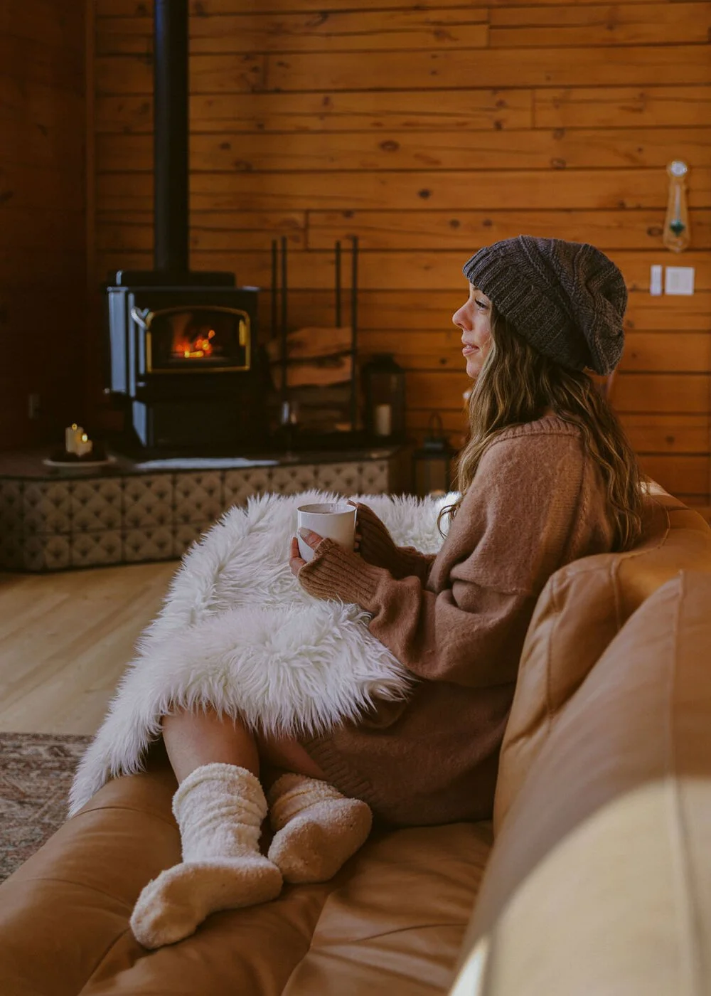 Cozy mug by the wood-burning fire — mountain cabin escape near San Diego