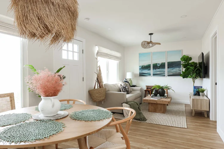 The living room seen from the dining nook in Unit One at The Swell, Oceanside