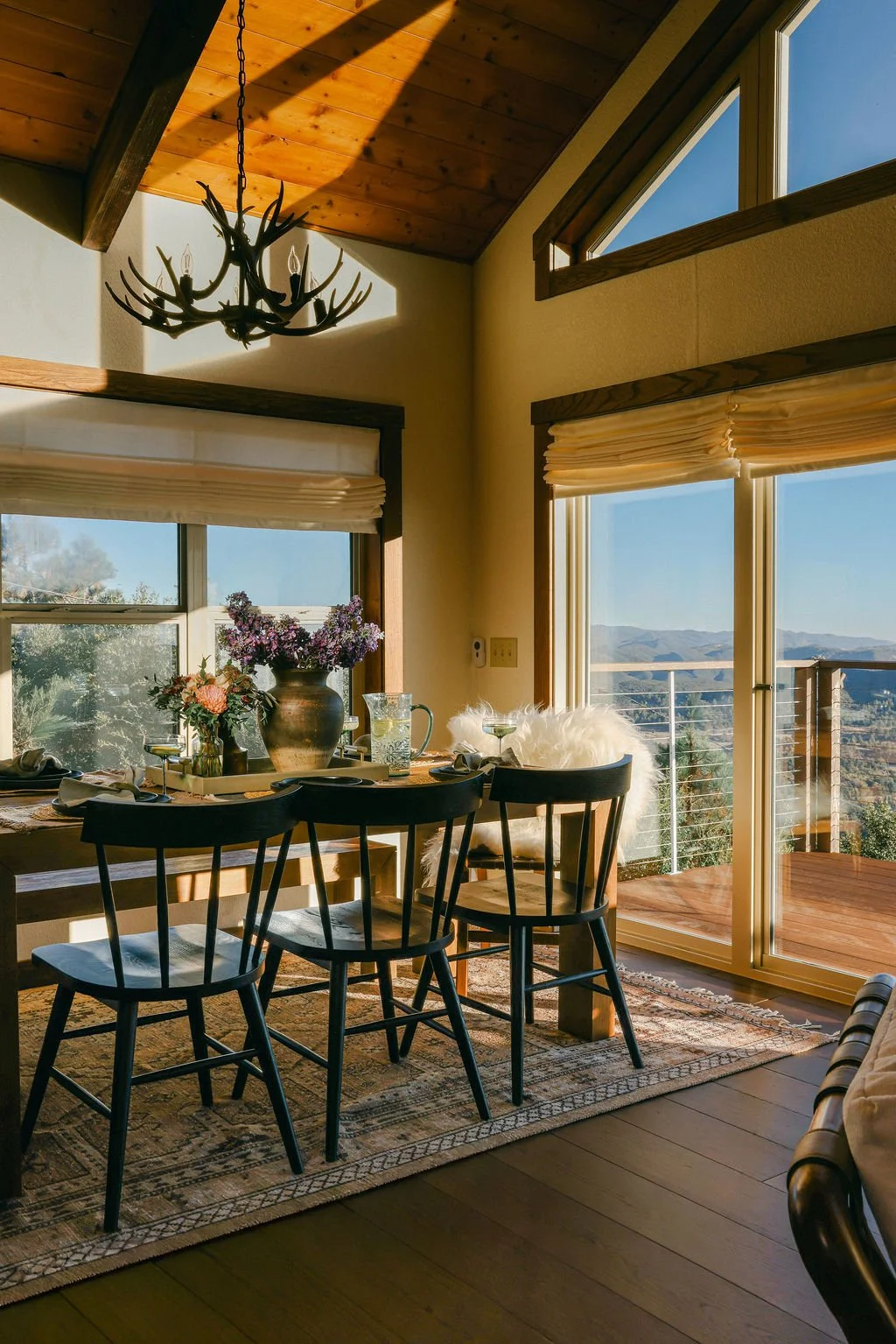 Dining table for 12 with lake and mountain views at Wild Moon Ranch, a group retreat house near Julian