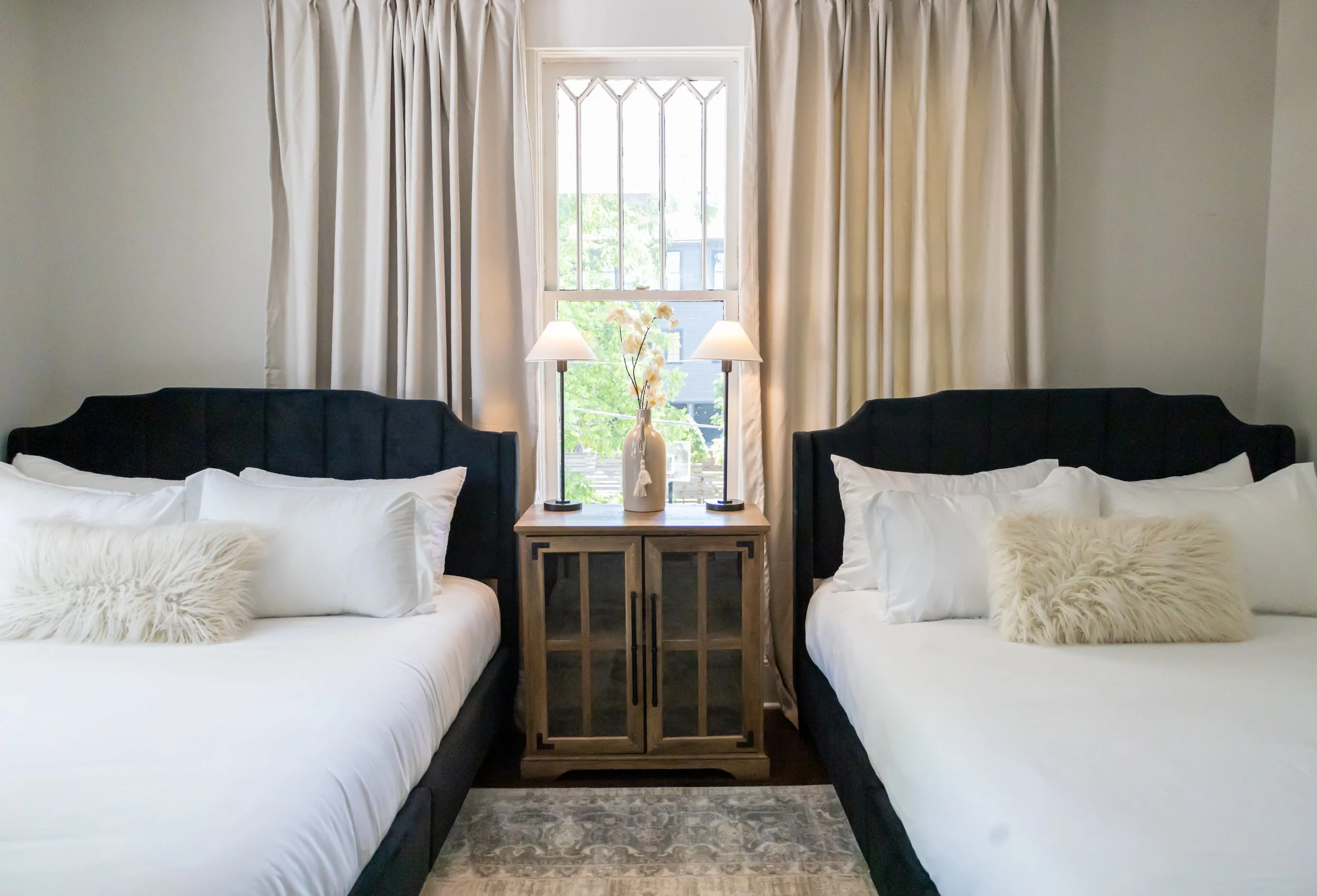 Bedroom at Elmsgate in Birmingham, designed by Salt and Sky Lodging Co.