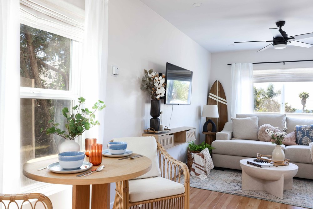 The living room and TV wall in Unit Two at The Swell, Oceanside