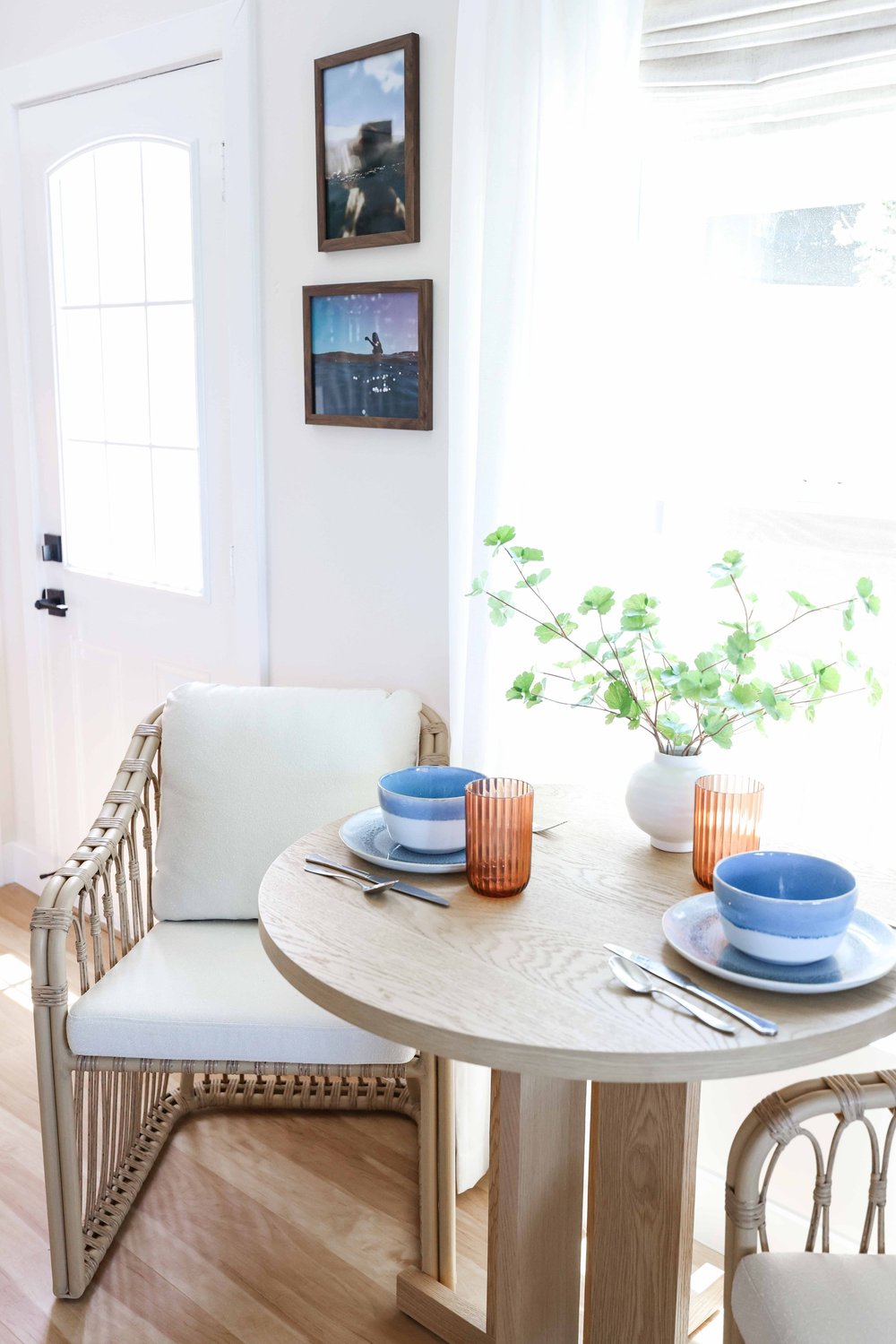 The bistro table set for dinner in Unit Two at The Swell, Oceanside