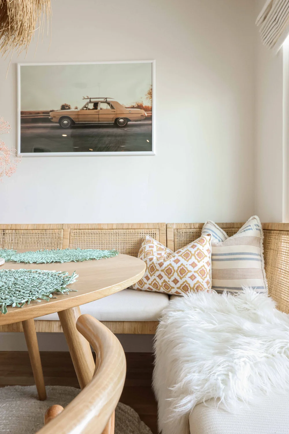 The built-in bench with a sheepskin throw in Unit One at The Swell, Oceanside