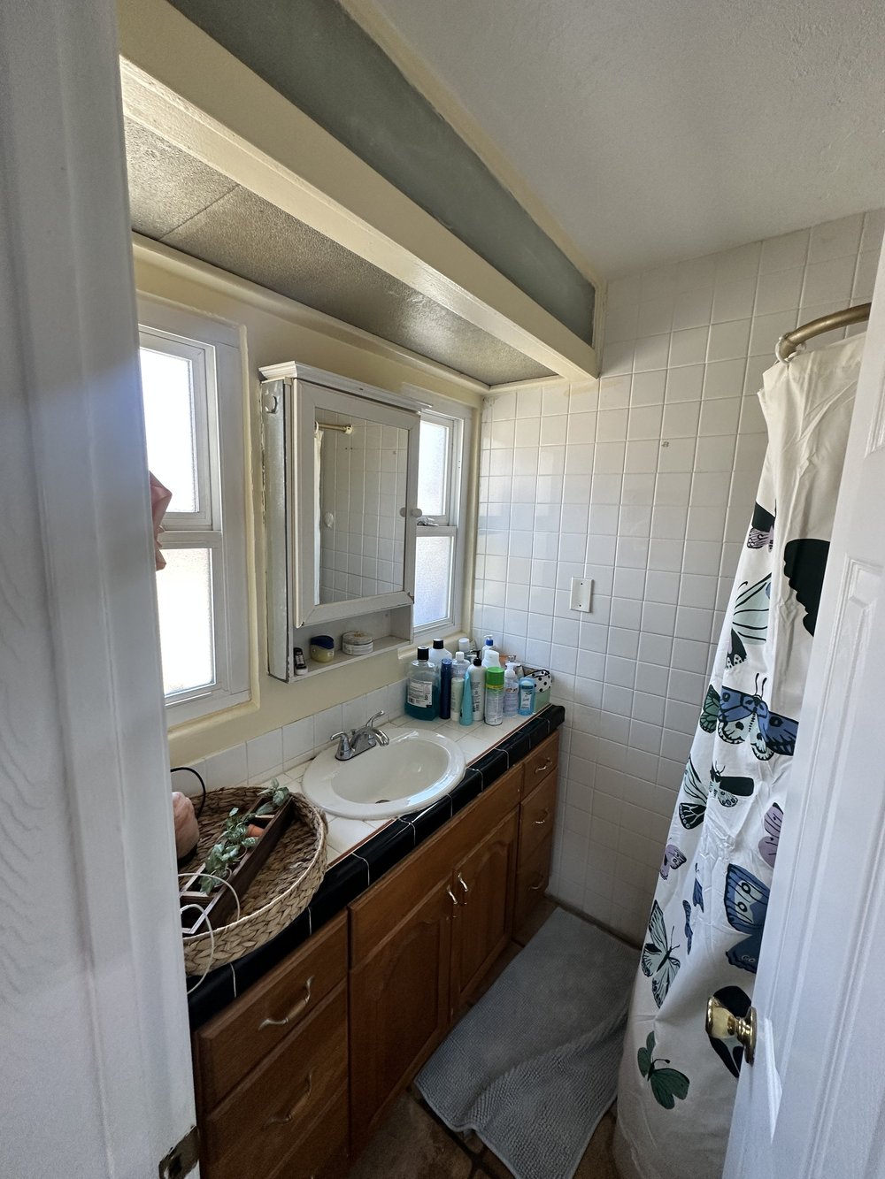 Before: Bathroom vanity at Clementine B in Oceanside