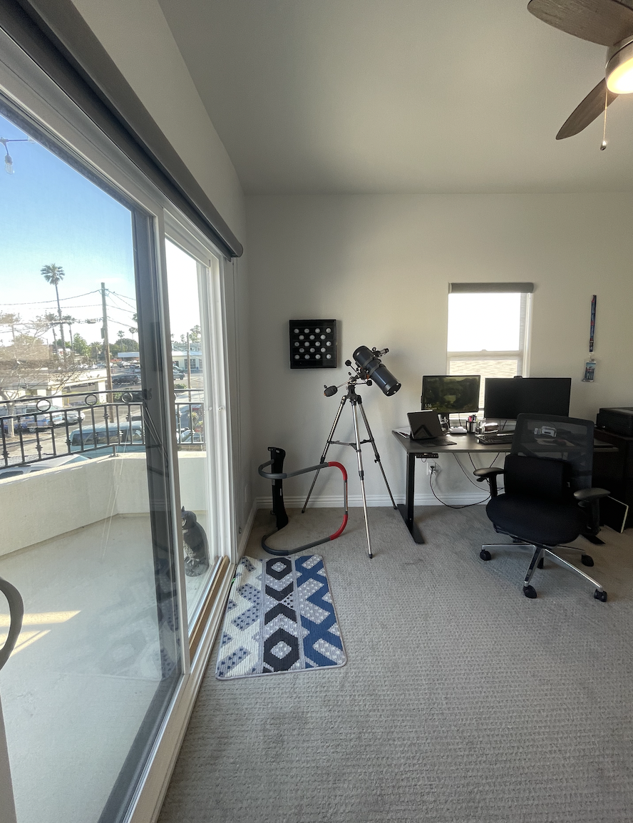 Before: Spare room used as a home office at Coastal Palm in Pacific Beach
