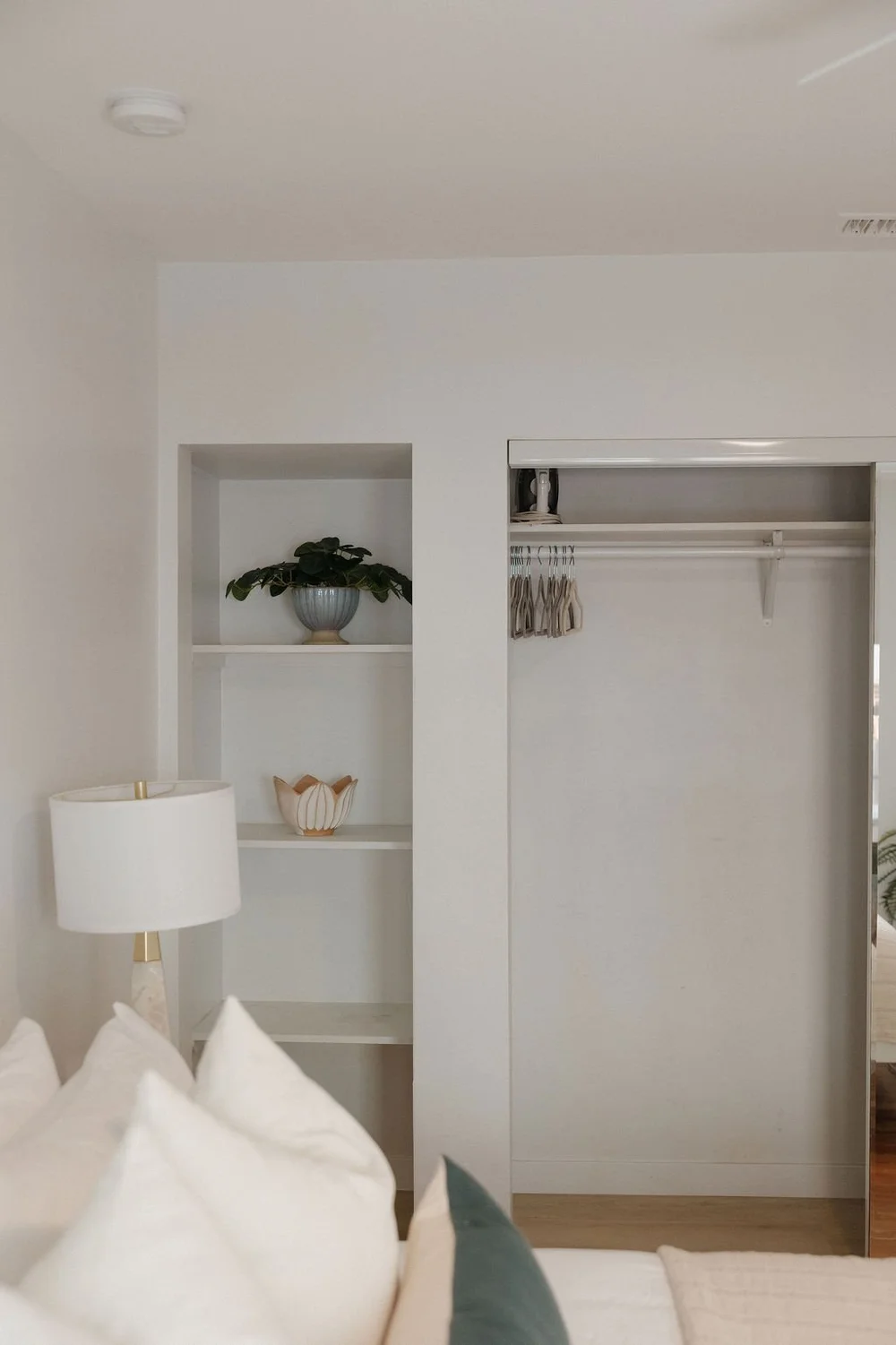Built-in shelves and a closet in a bedroom at The Villa