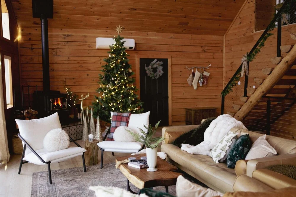 Living room at Dark Moon Chalet decorated for Christmas, a holiday A-frame cabin near Julian, CA