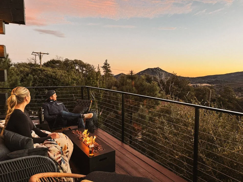 Sunset by the deck fire pit with valley and mountain views — A-frame cabin near Lake Cuyamaca