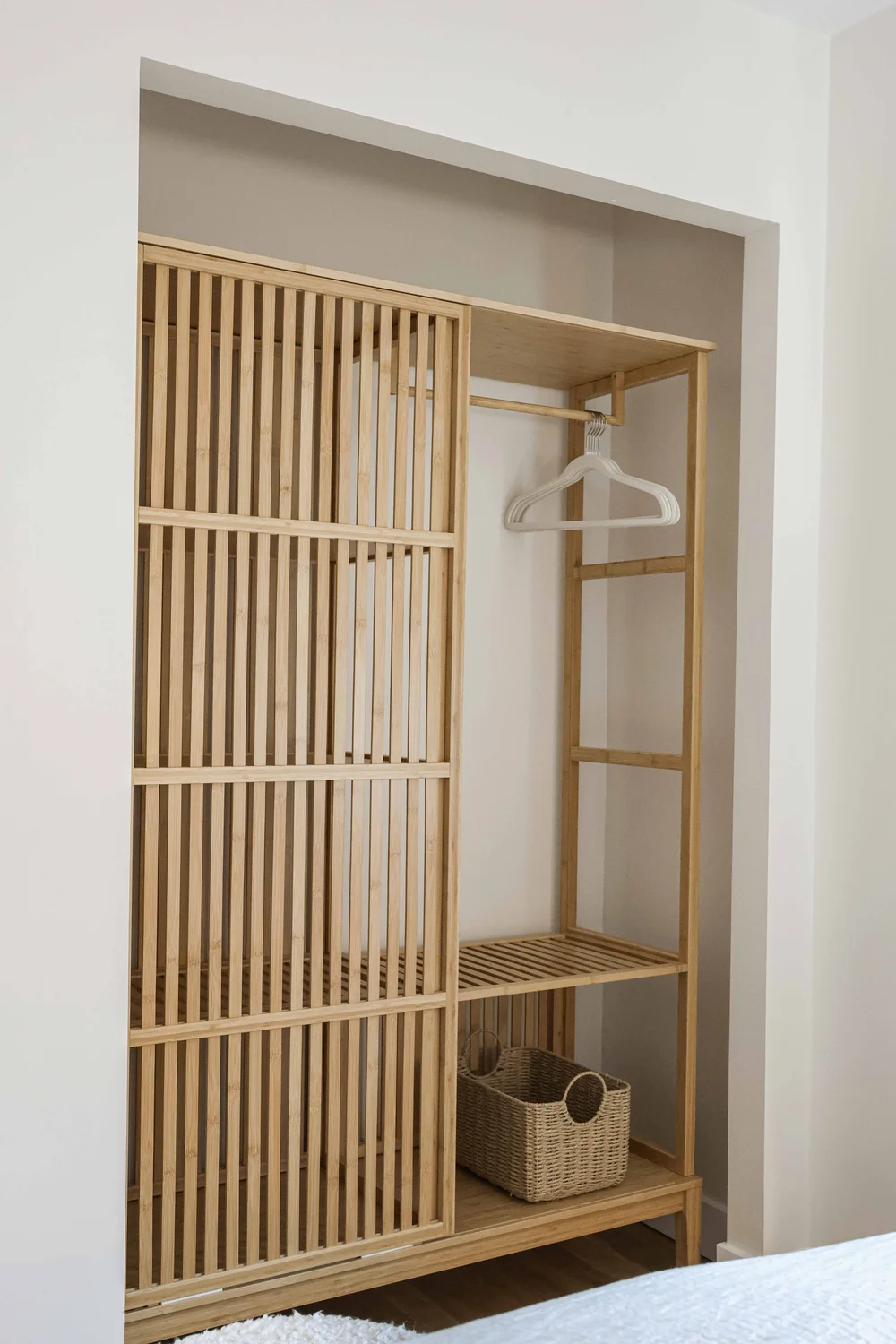 The slatted wood wardrobe in the first bedroom in Unit One at The Swell, Oceanside